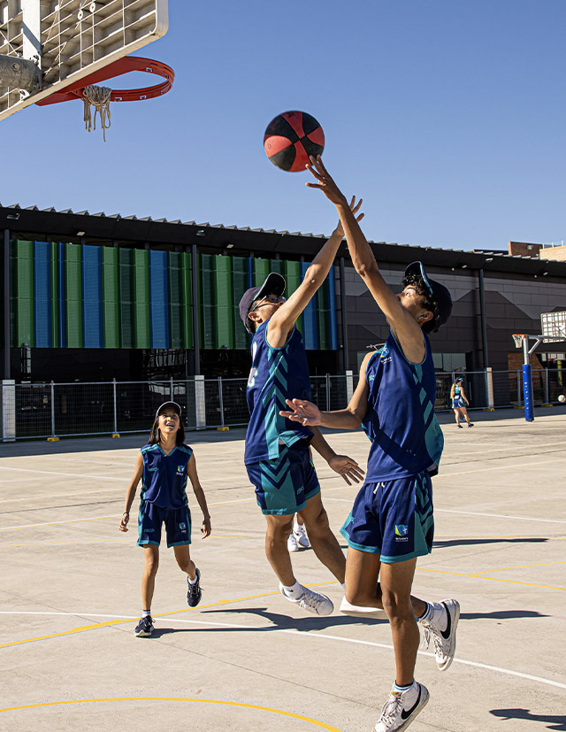 St Luke's Catholic School Marsden Park students playing basketball