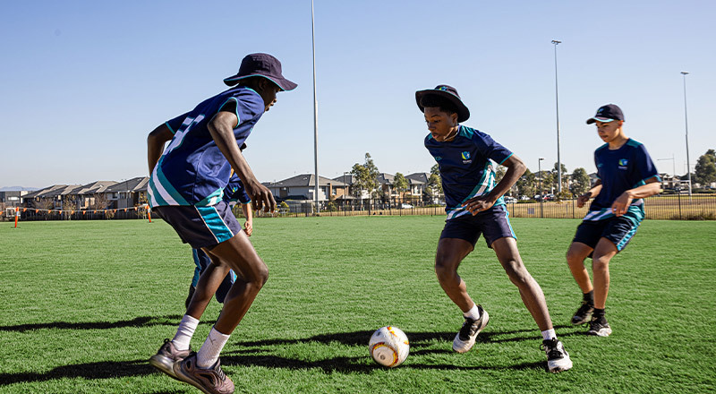 St Luke's Catholic School Marsden Park students playing soccer