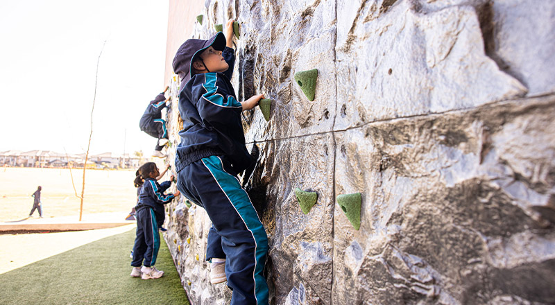 St Luke's Catholic School Marsden Park students on rock climbing wall