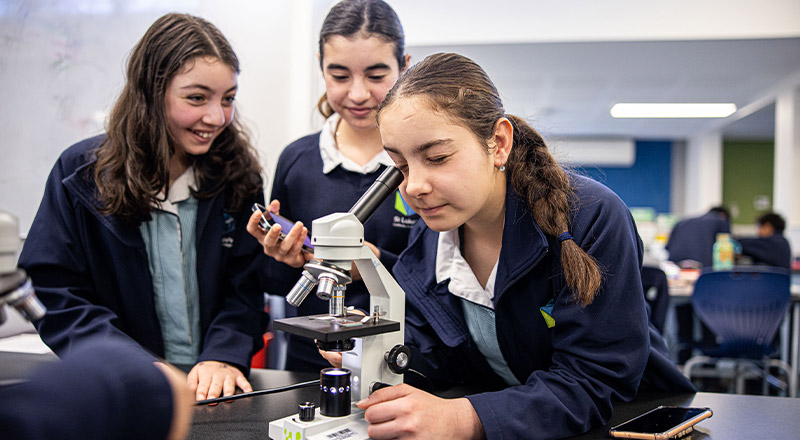 St Luke's Catholic School Marsden Park students using microscope