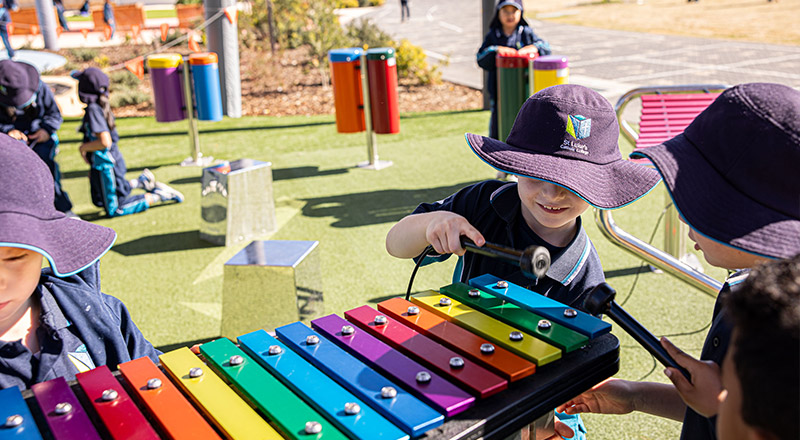 St Luke's Catholic School Marsden Park students playing toy xylophone