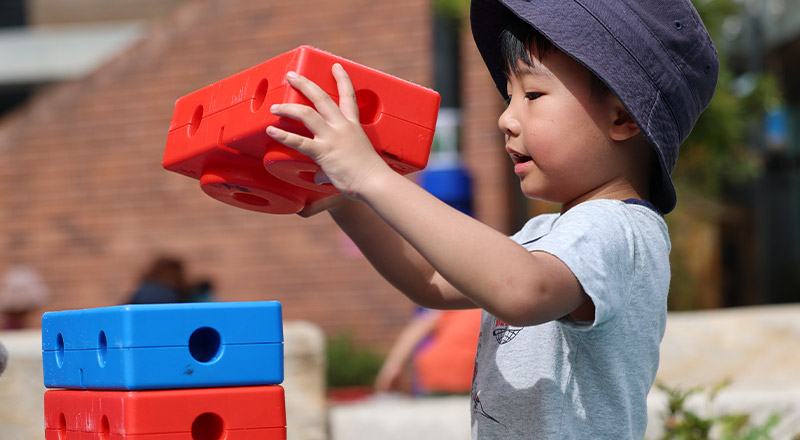 St Luke's Catholic School Marsden Park Early Learning Centre student in sandpit