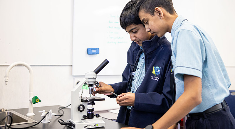 St Luke's Catholic School Marsden Park students using microscope