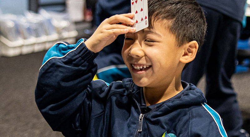 St Luke's Catholic School Marsden Park student playing a card game