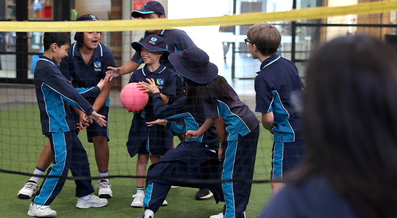 St Luke's Catholic School Marsden Park students playing volleyball