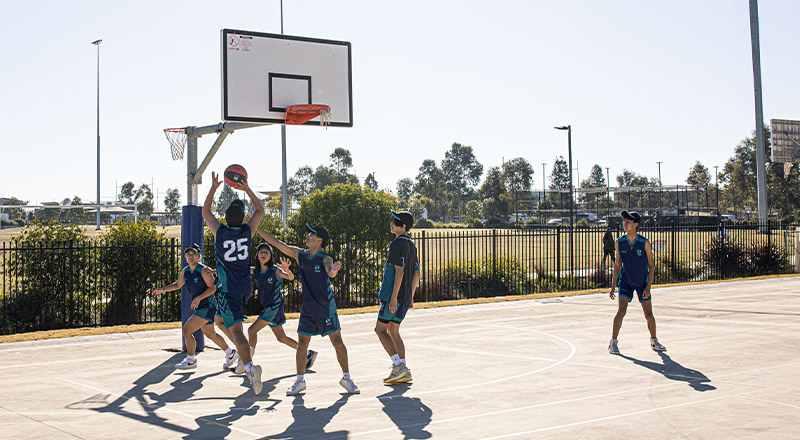 St Luke's Catholic School Marsden Park students playing basketball
